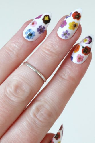 Colorful flower nail decals on white nails - nail art, flower nail design good reason nail art designs